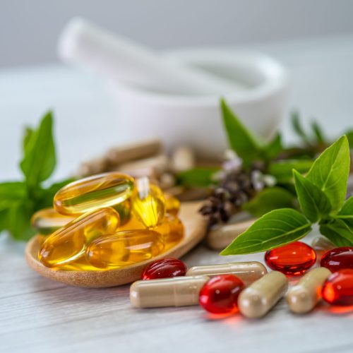 Alternative medicine herbal organic capsule with vitamin E omega Alternative medicine herbal organic capsule with vitamin E omega 3 fish oil, mineral, drug with herbs leaf natural supplements for healthy good life.